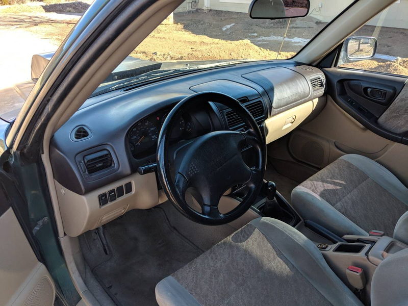 Illustration for article titled At $3,500, Will This Supercharged 1999 Subaru Forester Blow Your Mind?